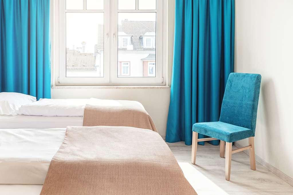 Hotel B99 Offenbach am Main Pokoj fotografie